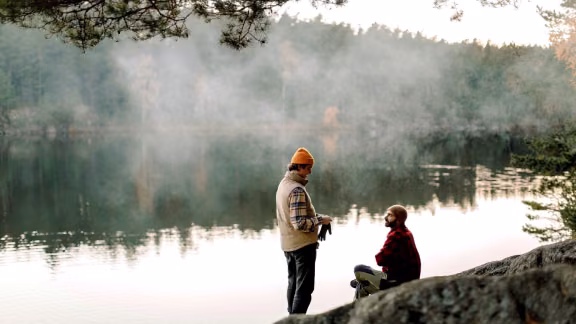 Men at lake